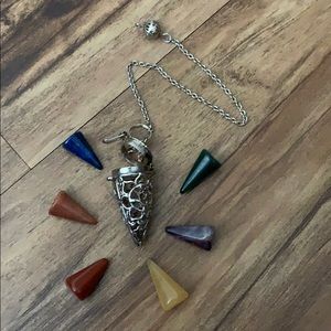 Pendulum with stone inserts.